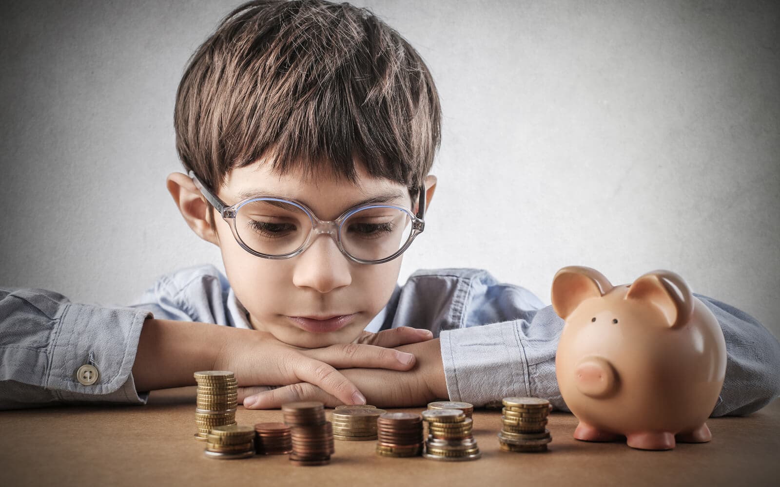 Cum să-ți educi copilul despre bani. Pași esențiali pentru un viitor financiar sănătos