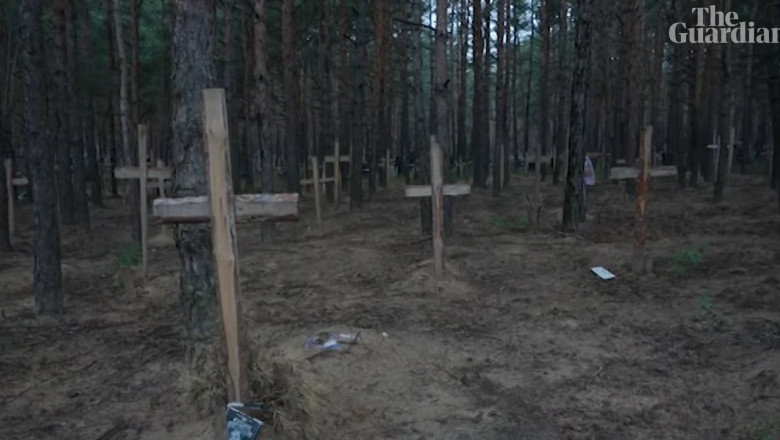 Groapă comună cu 440 de cadavre descoperită la Izium. Zelenski: Rusia lasă în urmă numai moarte